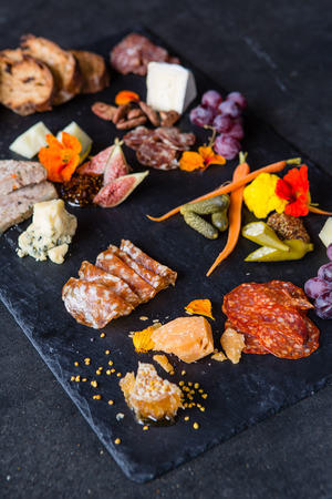 Cheese and meat tapas plate at Masters Oceanside Happy Hour in Oceanside California Cheese and meat tapas plate at Masters Oceanside Happy Hour in Oceanside California